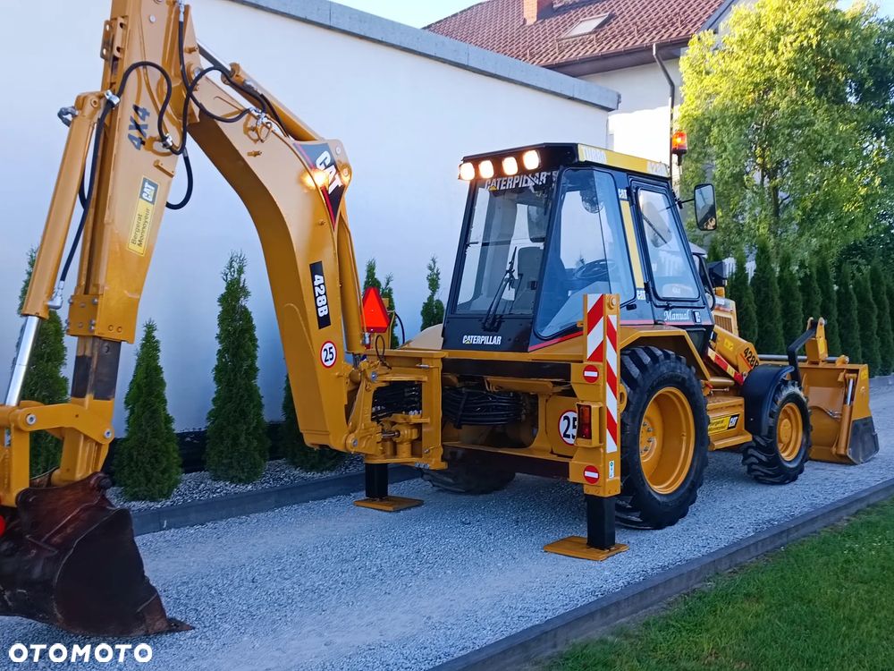 Caterpillar 428 B - 12
