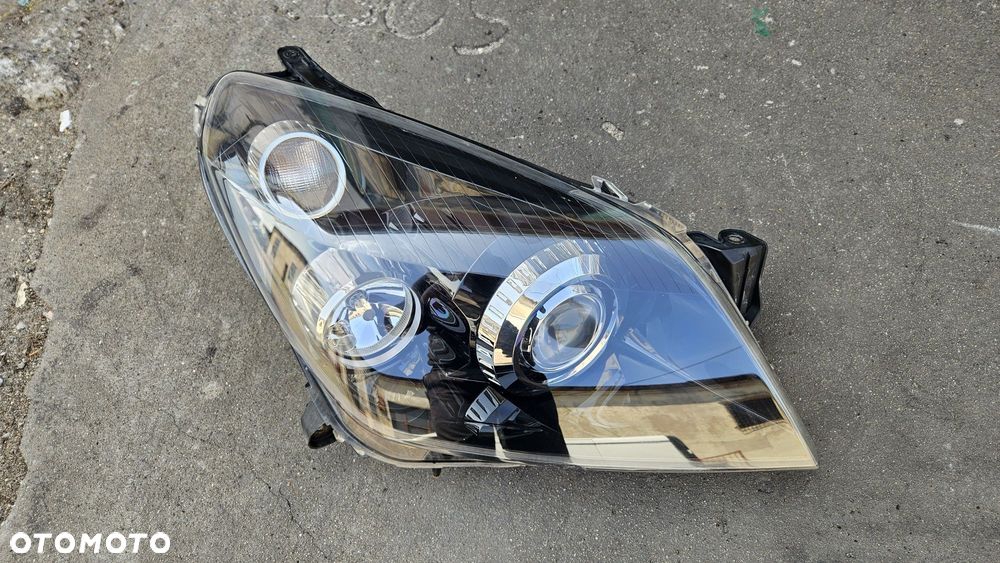 Lampa prawa reflektor prawy bixenon xenon skrętny opel astra h igła - 1