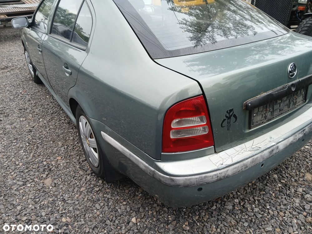 skoda octavia I 9596 M7 F6G maska pokrywa silnika klapa bagażnika zderzak lampa reflektor pas - 4