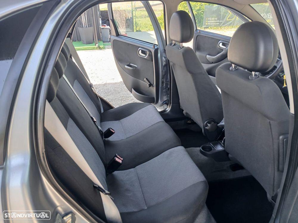 Opel Corsa 1.2 16V Cosmo - 8