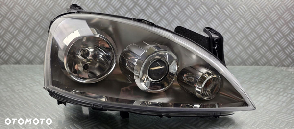 0096726 reflektor lampa prawa przód OPEL CORSA C LIFT 03-06 SOCZEWKA EUROPA