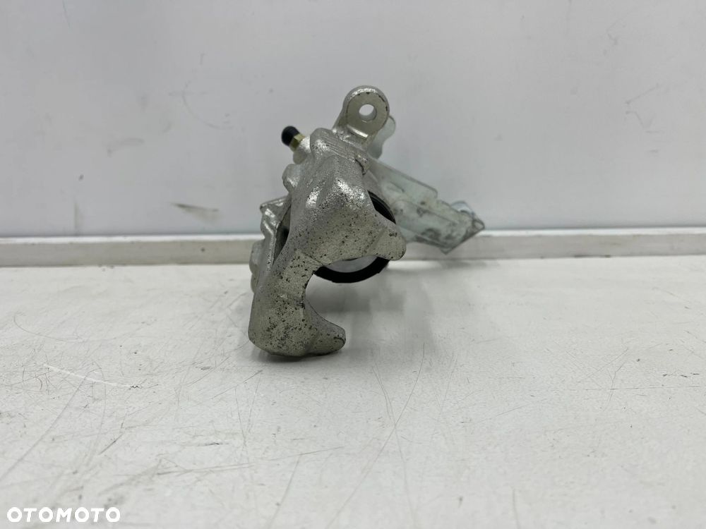 Zacisk hamulcowy Nissan Almera N16 Almera Tino Primera P11 96-06r. NOWY prawy tylny zacisk prawy tył - 2