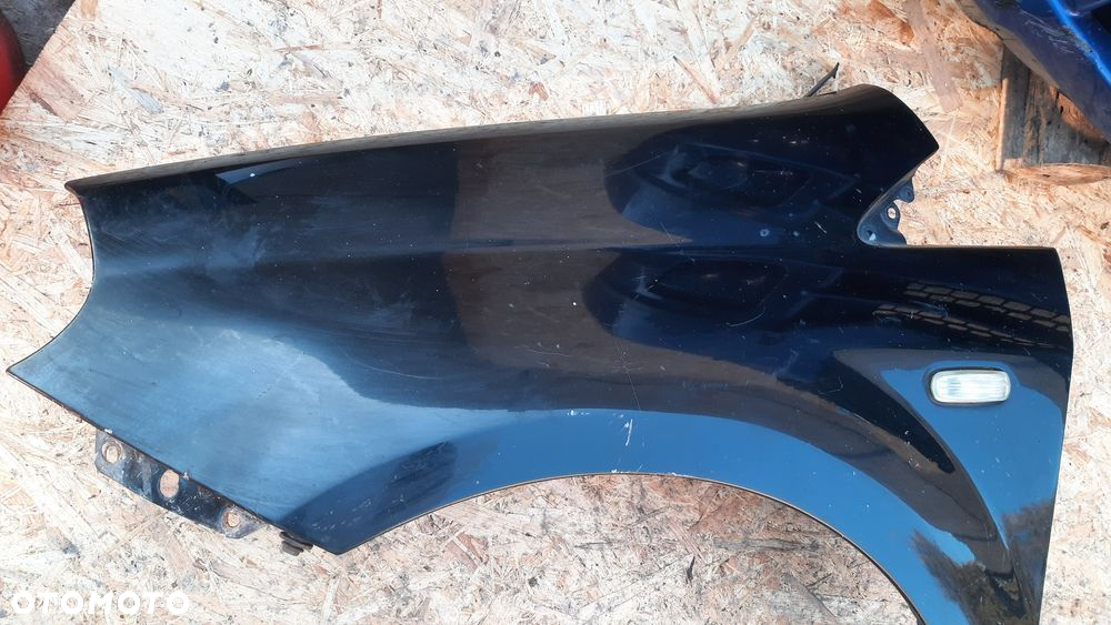 Fiat Grande Punto błotnik lewy przedni CzarnY - 2