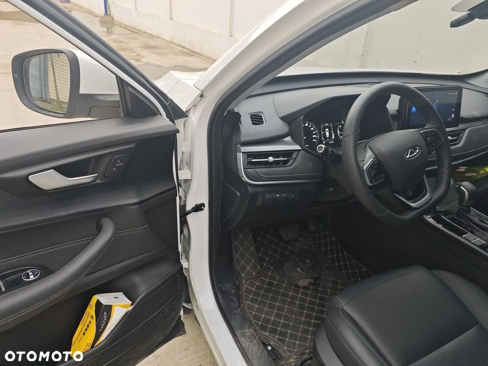 Chery Tiggo 4 1.5 GDI HEV Essential DHT - 12
