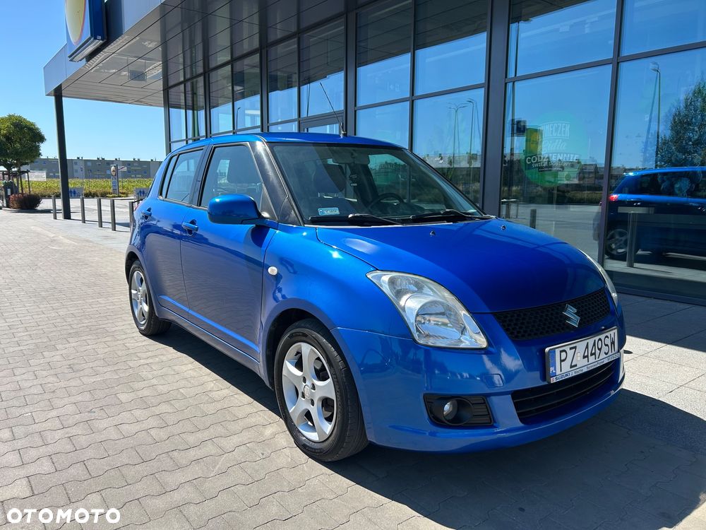 Suzuki Swift 1.3 Club - 4