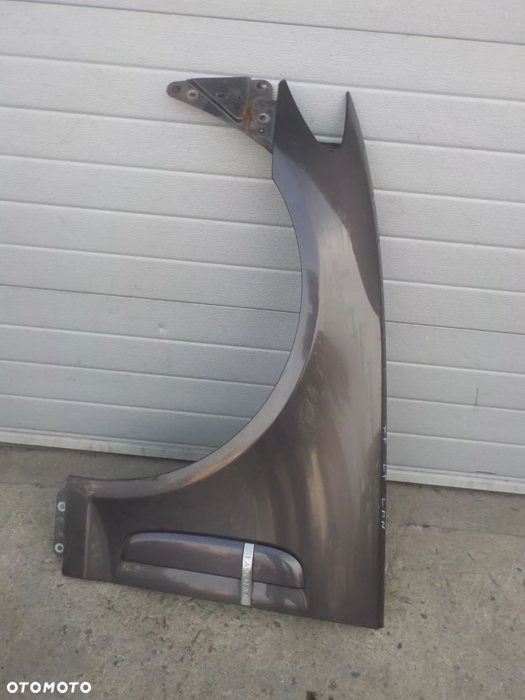 JAGUAR XF X250 BŁOTNIK LEWY PRZÓD PRZEDNI LMN - 1