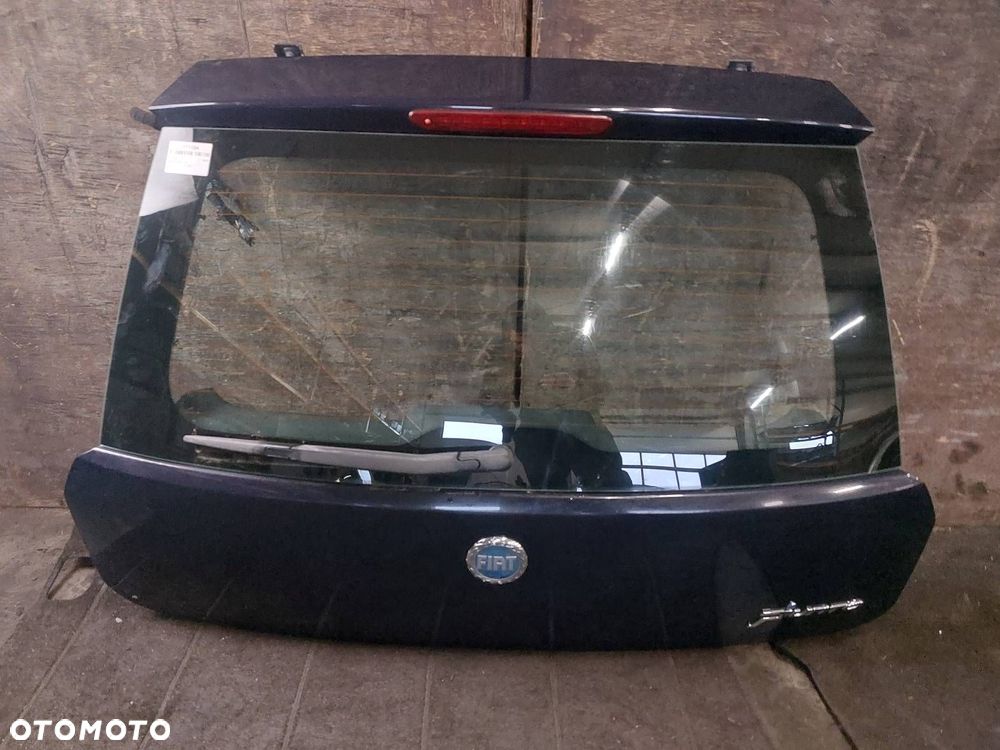 KLAPA BAGAŻNIKA ZDERZAK LAMPY GRANDE PUNTO I 475 - 22