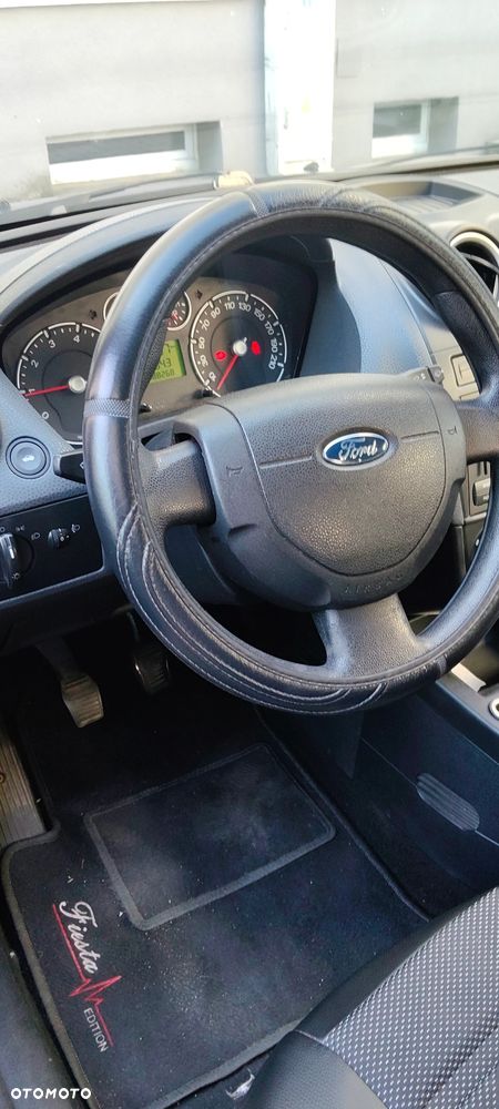 Ford Fiesta 1.4 - 9