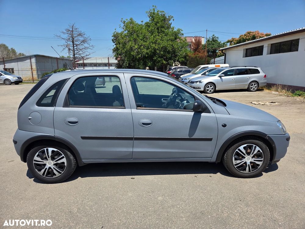 Opel Corsa 1.2i Cosmo - 4