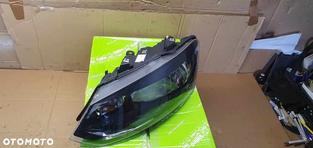 Lampa lewy przód przednia lewa VW Polo IV 6R Nowa TYC - 5