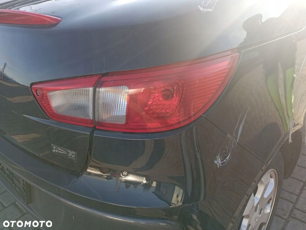 MITSUBISHI COLT VI CZC CABRIO LAMPA PRAWA TYŁ TYLNA W BŁOTNIK