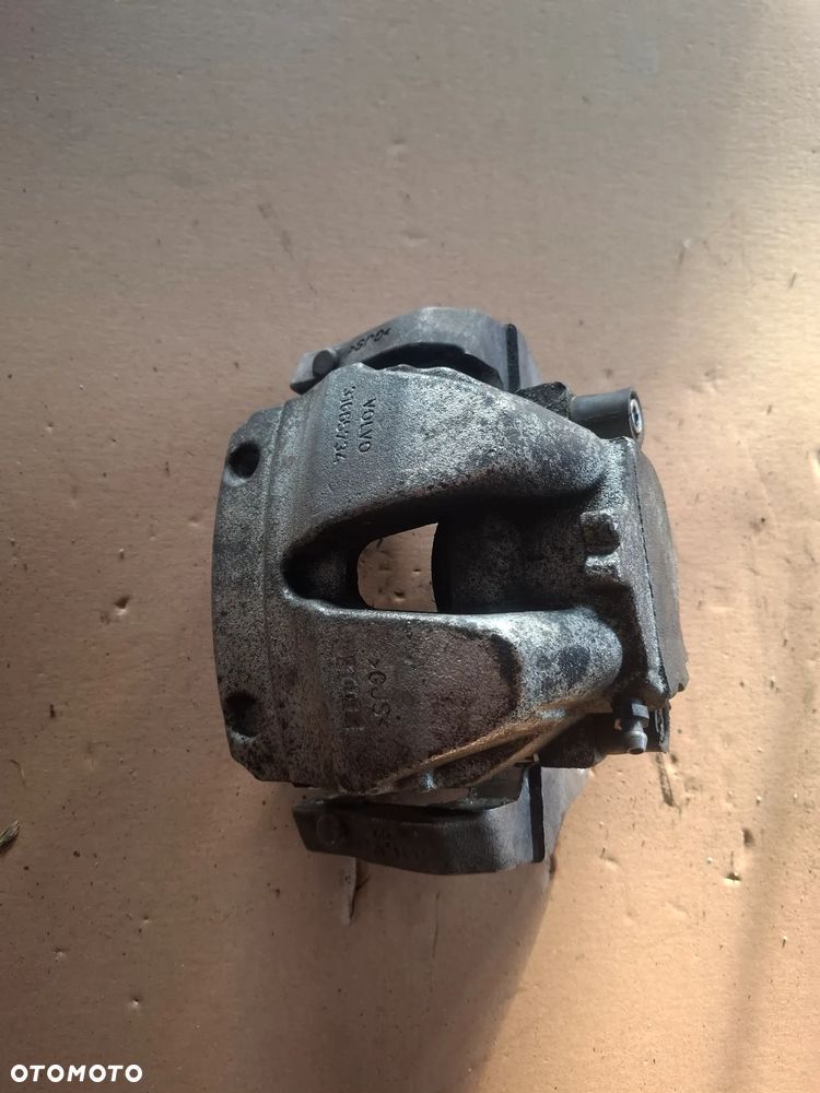 Volvo XC60 II zacisk lewy przód 31665734 - 1