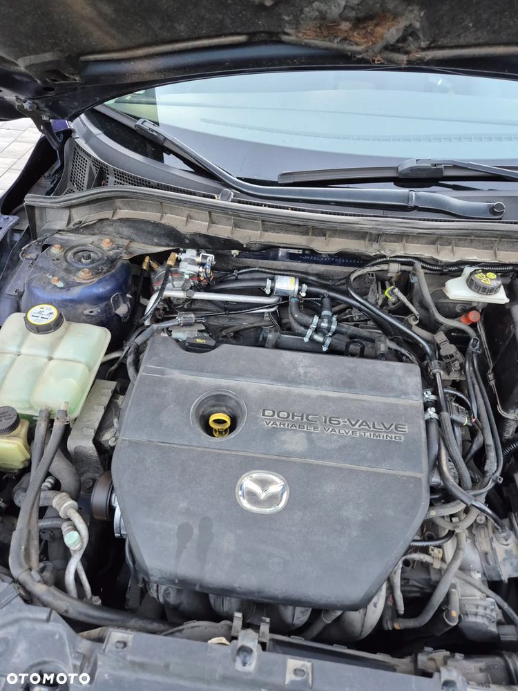 Mazda 3 2.0 Exclusive + - 15