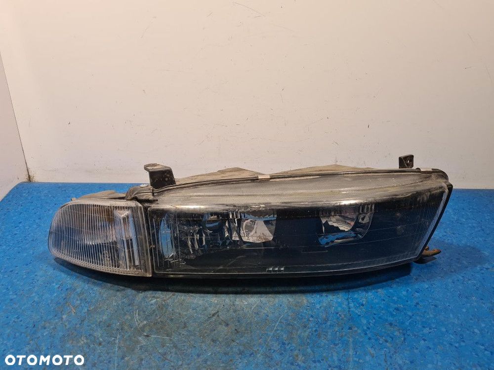 MITSUBISHI GALANT VIII LIFT REFLEKTOR PRAWY - 1