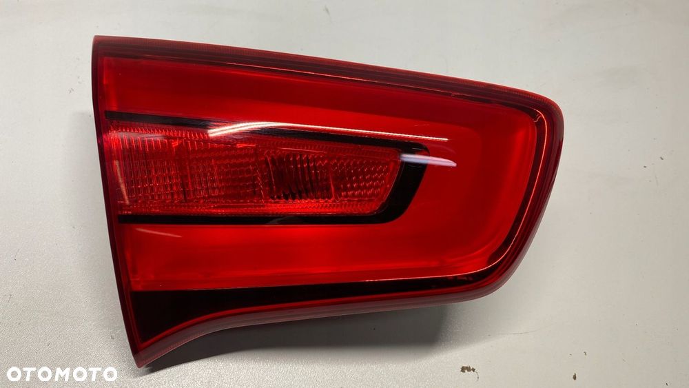 KIA SPORTAGE III LIFT LAMPA LEWA LEWY TYŁ TYLNA W KLAPĘ 13-15 - 2