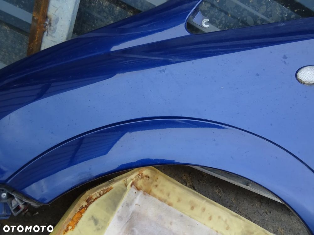 Błotnik Opel Meriva A lewy przód niebieski - 7