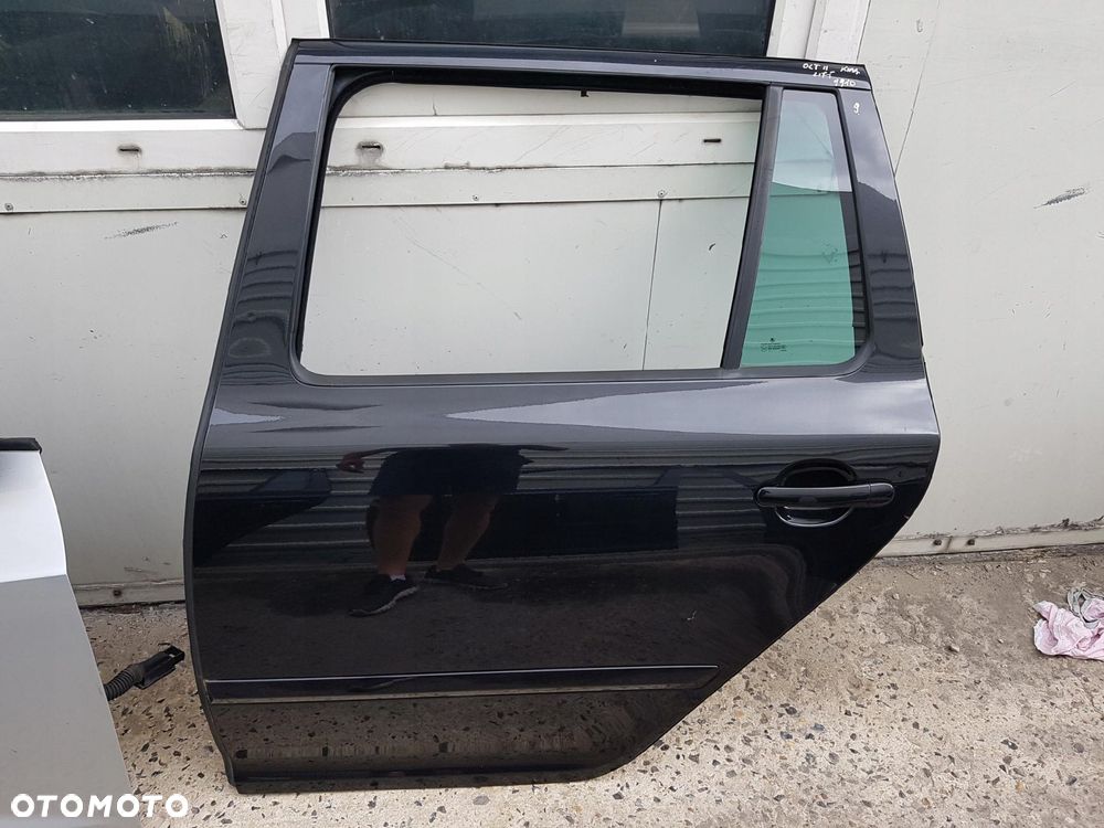 SKODA OCTAVIA 2 II LIFT 08-12r KOMBI DRZWI LEWE TYŁ 9910 - 1