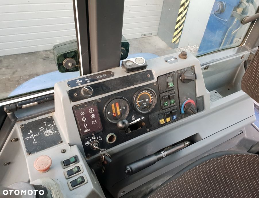 Case 595 Super LE ładowarka kołowa - 14