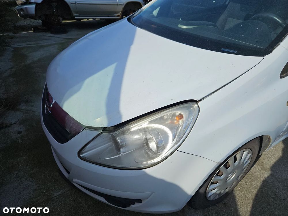 Maska Opel Corsa D 2009r Y474 3d hatchback - 2