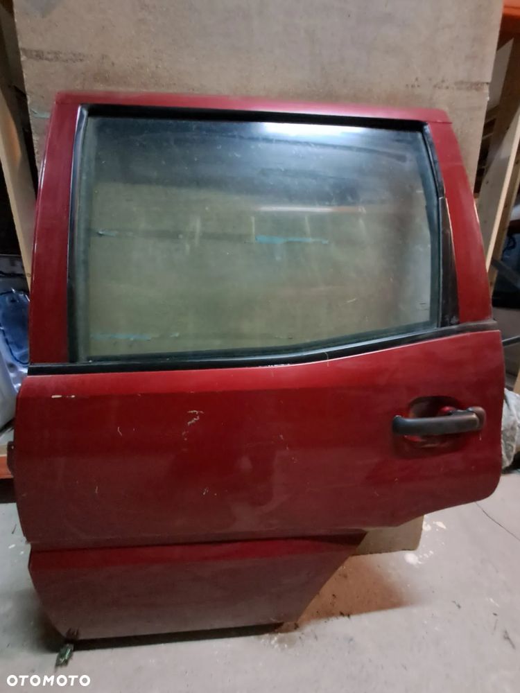 Drzwi Nissan Terrano II 93-03' lewy tył (czerwone)