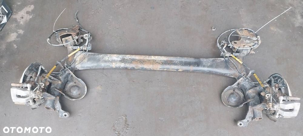 BELKA OŚ ZAWIESZENIA TYŁ TARCZE Z ABS RENAULT MEGANE III KOMBI 1.6 16V - 1