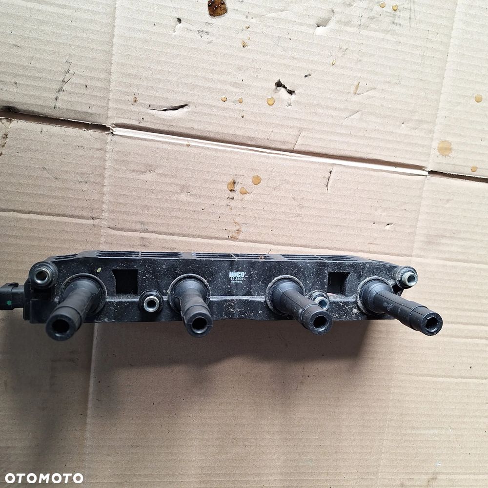 CEWKA ZAPLONOWA CORSA C 1.4 133809 - 1