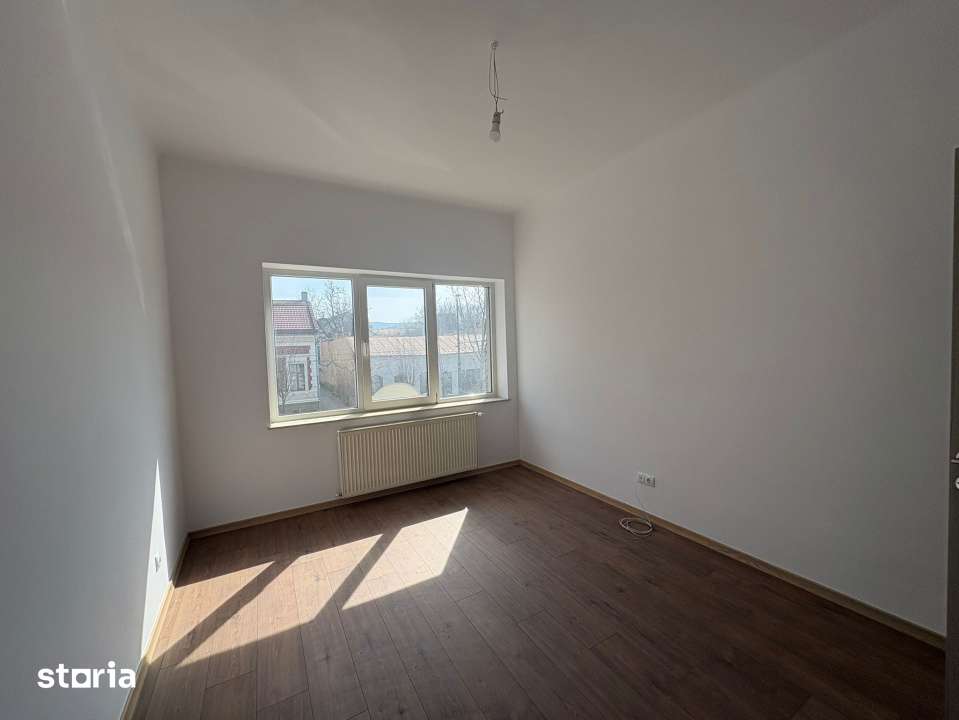 Apartament cu 3 camere, balcon cu priveliste catre gradina — fotografia 3