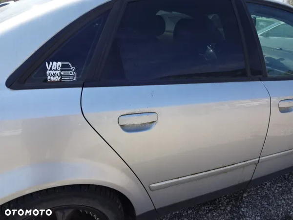 Kompletne prawe tylne drzwi Audi A4 B6,kod lakieru LY7W