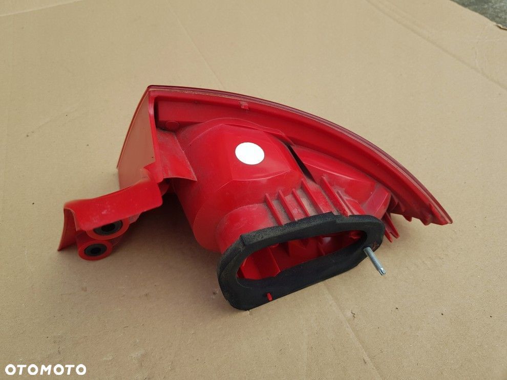 SEAT LEON II 05- LEWA TYLNA LAMPA ORYGINAŁ 1P0945111D STAN BDB - 11