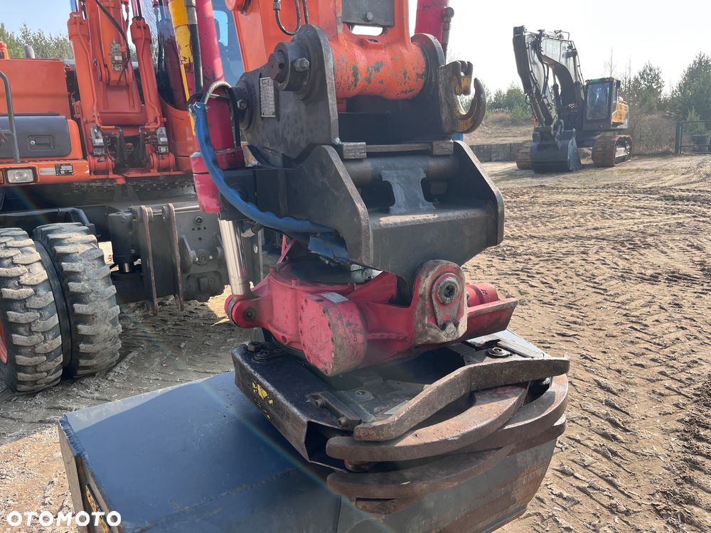 Doosan DX140W - 12