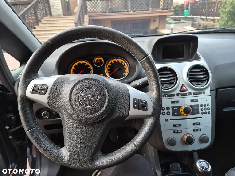 Opel Corsa 1.4 16V Active - 24