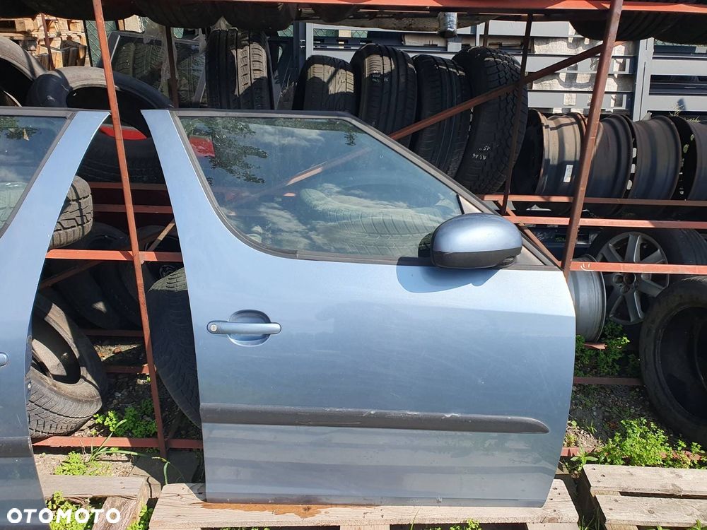 DRZWI L/P PRZÓD SKODA ROOMSTER KOD 9154 - 7