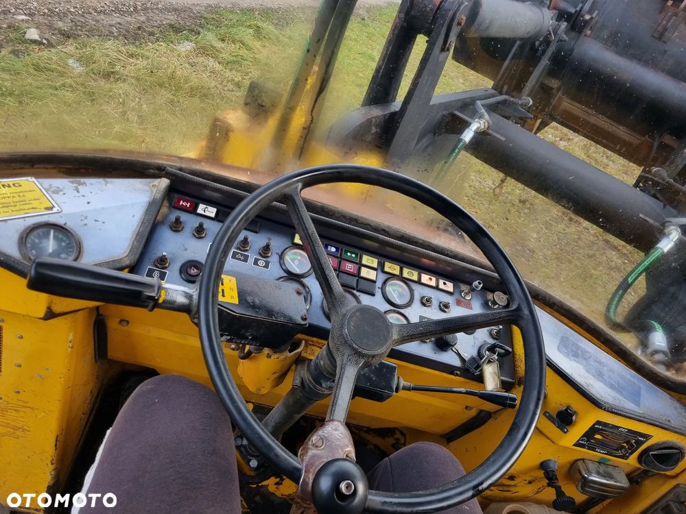 Volvo BM 4400 Ładowarka Fadroma Sprowadzona z Norwegii Widły Łyżka Bocian Wysięgnik! Aktualne badania w DEKRA! Oryginał zadbana Bez luzów i wycieków Potężna Moc. Nie pracowała w Kraju! 6 cylindrów pneumat Hamulec Opony jak Nowe - 38