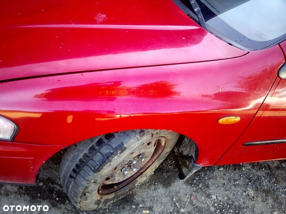 Mazda 323 323p BA Błotnik przedni Lewy Prawy SU - 1
