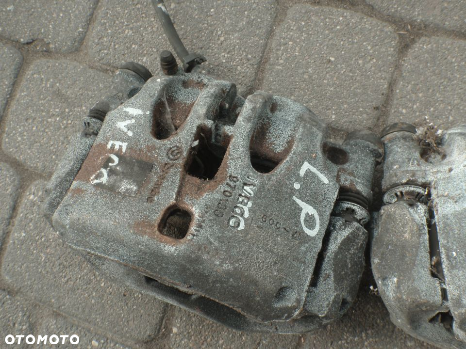 zacisk jarzmo hamulcowy prowadnica tył iveco daily 35c  oryginał jak nowy orginał - 12