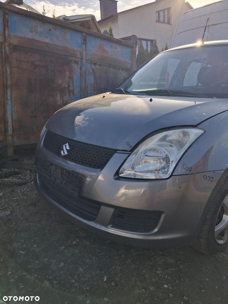 Suzuki Swift 05 zderzak przod ZCD - 6