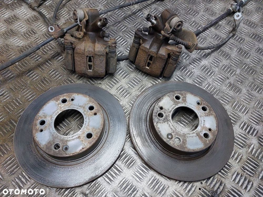 TARCZE HAMULCOWE TYŁ + KLOCKI + ZACISKI HONDA CIVIC VIII SEDAN - 2