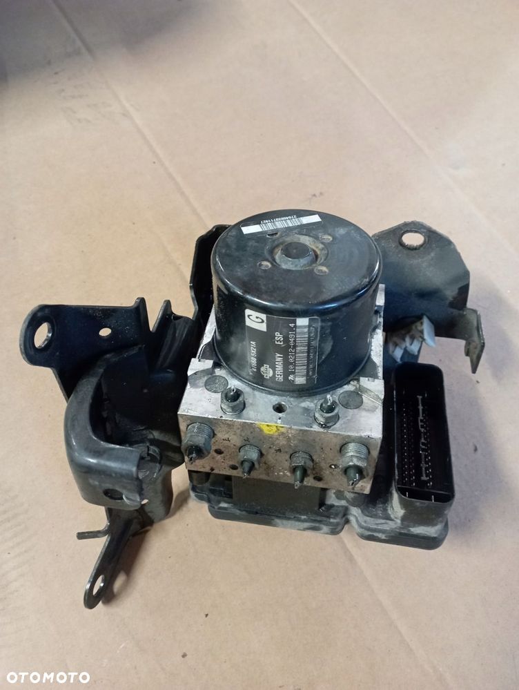 NISSAN NAVARA III 3 D40 POMPA ABS 476605X21A - 1