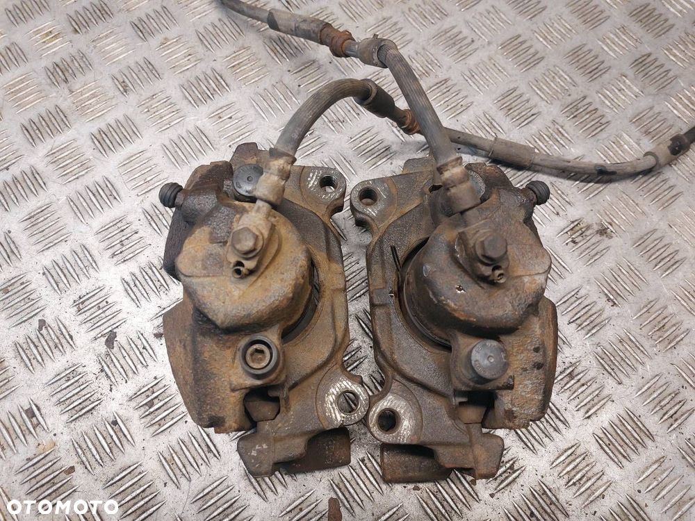 TARCZE HAMULCOWE PRZÓD + KLOCKI + ZACISKI VOLKSWAGEN TOURAN I 2.0 TDI - 11