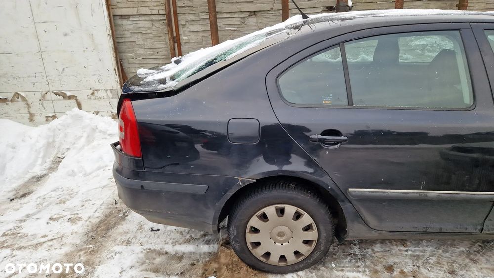 SKODA OCTAVIA II BŁOTNIK ĆWIARTKA PRAWY TYŁ 9910 - 1