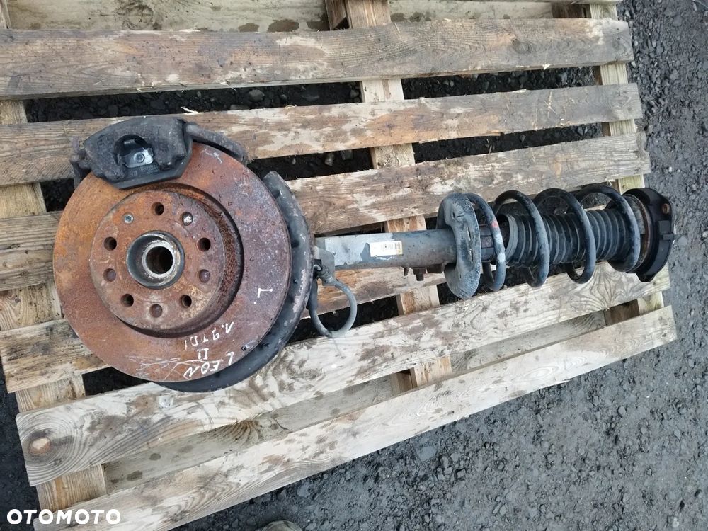 SEAT LEON II 05-12r TDI MCPERSON LEWY PRZÓD ZWROTNICA 1K0413031CT