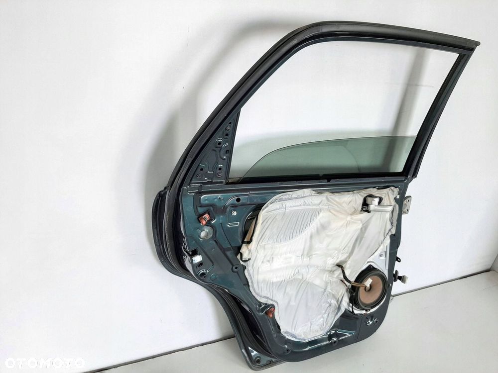 KIA SPORTAGE 2 II LIFT 09R DRZWI LEWY TYL KOD E2 - 15