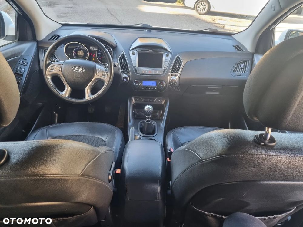 Hyundai ix35 1.7 CRDi 2WD blue Finale Gold - 17