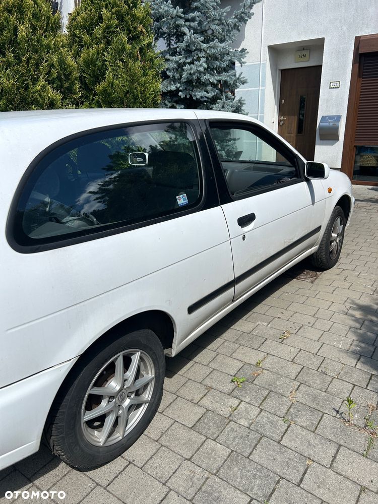 Nissan Almera 1.4 - 5