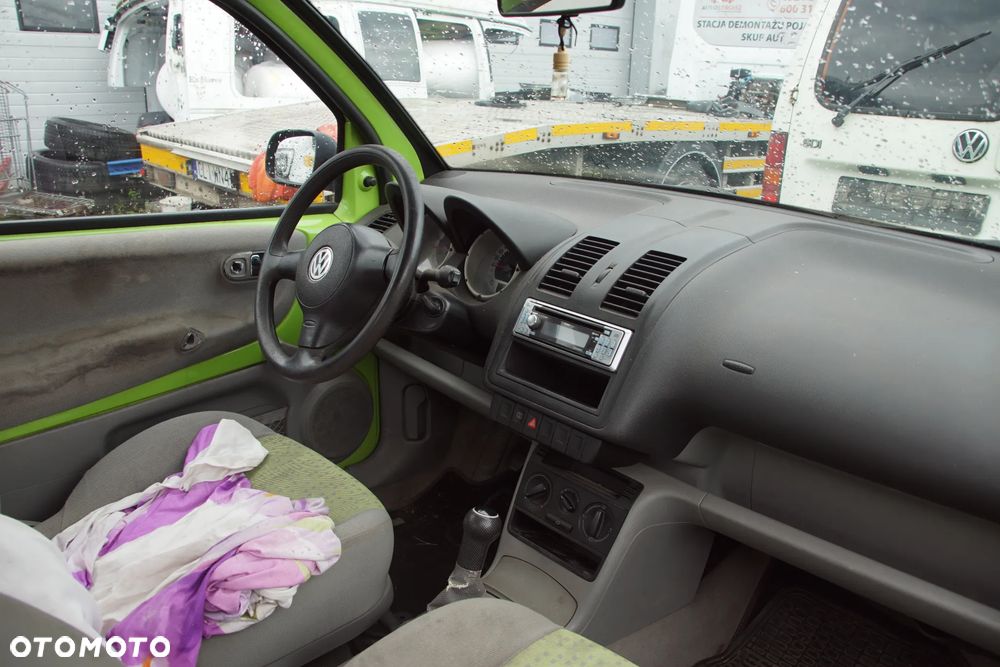 Auto na części - Volkswagen Lupo 1.0 MPI 50 KM ALL DKG LR6A 1998R Silnik Skrzynia Drzwi Maska Błotnik Zderzak Klapa Lampa Lusterko Klamka Szyba Deska Kokpit Sterownik Moduł Czujnik Licznik Panel Kierownica - 13