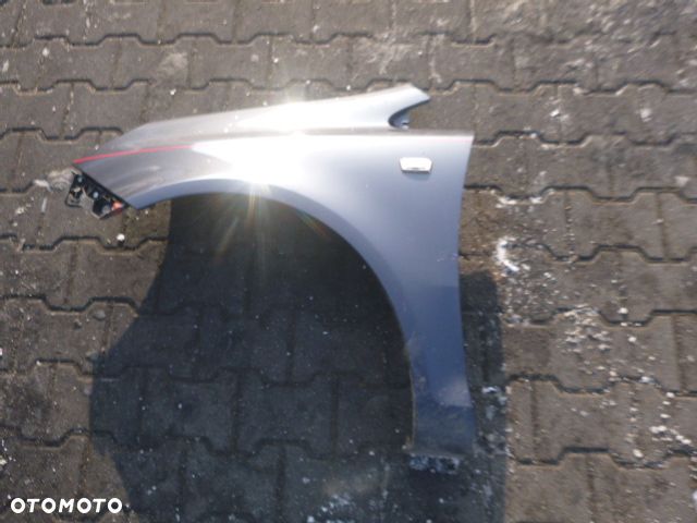 BŁOTNIK LEWY PRZÓD LEWY PRZEDNI OPEL CORSA D Z168 - 1