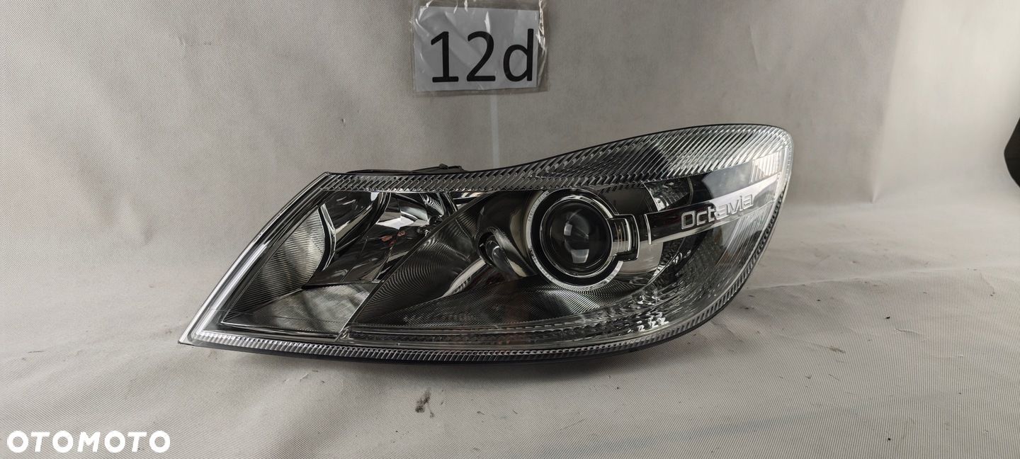 SKODA OCTAVIA II LIFT XENON LEWY SKRĘTNY REFLEKTOR 1Z1941015G LAMPA LEWA - 1