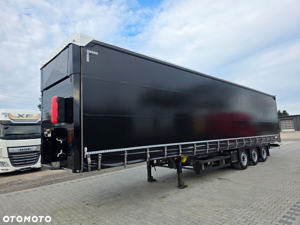 Schmitz Cargobull / FIRANKA / VARIOS / OS PODNOSZONA / CZTERY POZIOMY JAZDY / MULTI LOCK / XL - 9