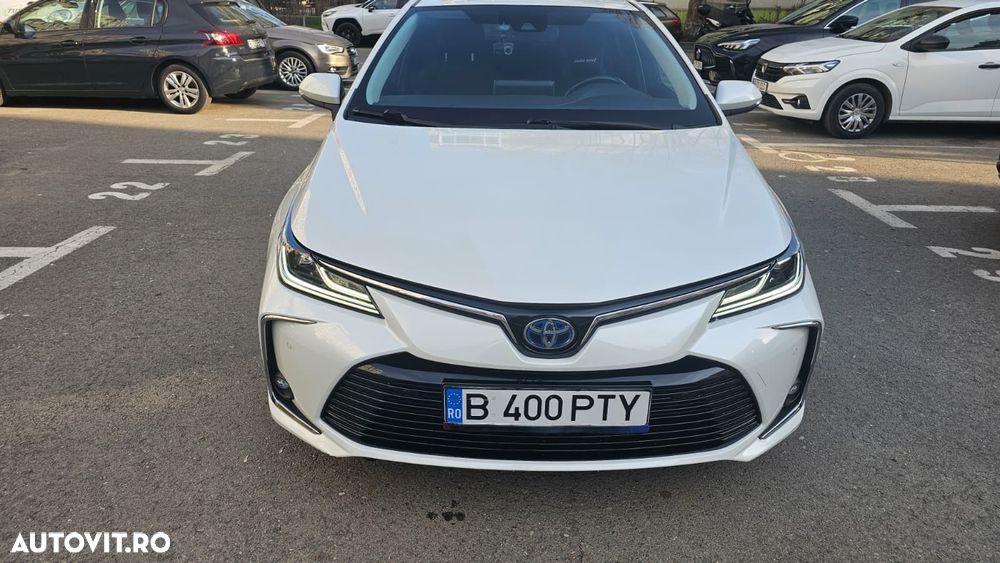 Toyota Corolla 1.8 HSD Exclusive - 7