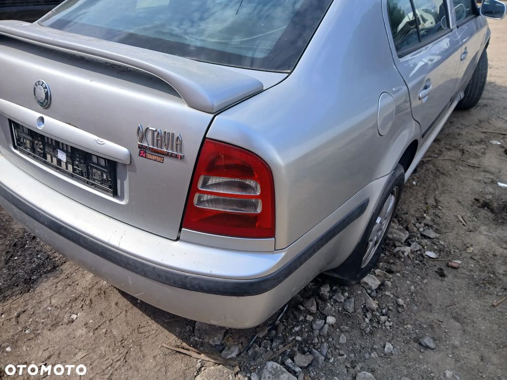 skoda octavia I 1 lift LF7T fotel fotele kanapa deska kokpit podsufitka boczek boczki klamka - 2